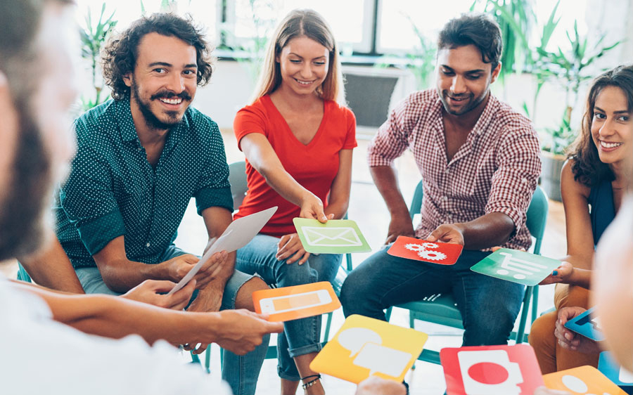 Group of people interacting with cue cards